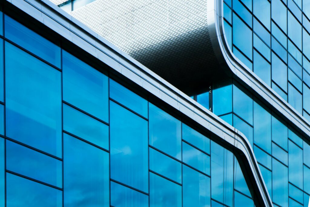 abstract modern architecture with blue glass facade